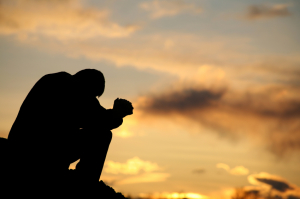 praying at sunset