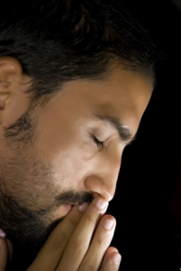 young man at prayer